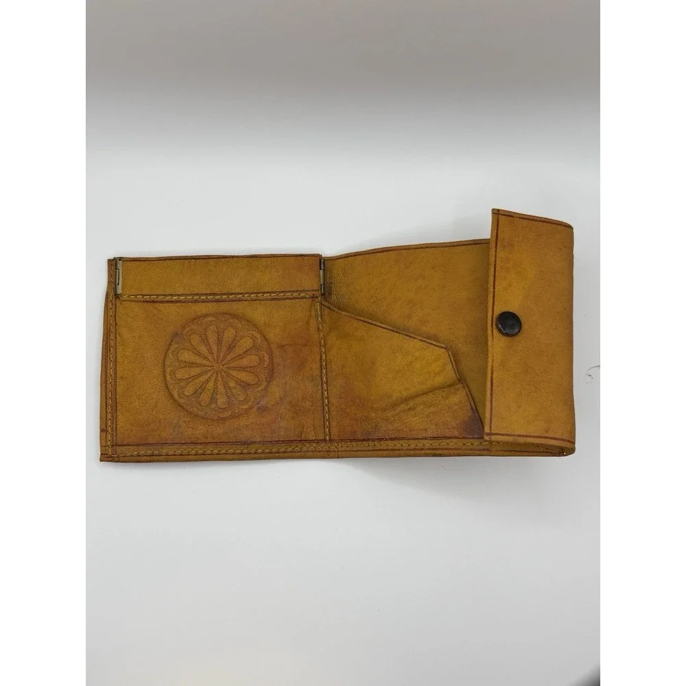 Handcrafted Moroccan leather wallet featuring snap closure